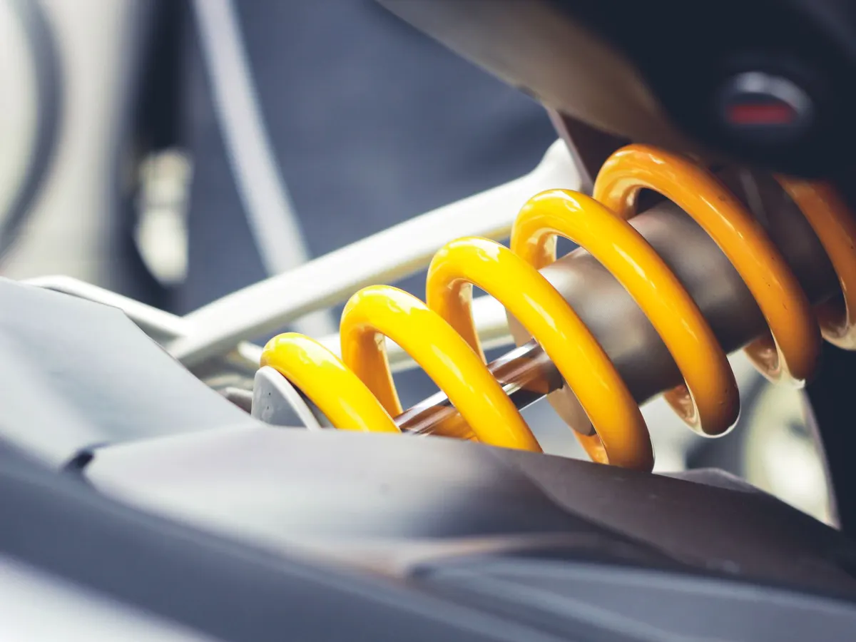 Shock absorber with a yellow coil spring